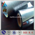 Heat absorbing film insulation material for buildings